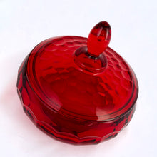 Load image into Gallery viewer, Vintage &quot;Georgian Ruby&quot; lidded pressed glass candy dish. This piece has a honeycomb detail and the lid is topped off with an egg-shaped final. Produced by Viking Glass between 1940 - 1998. Use as intended, or for bath salts/bombs as part of your bath decor. The deep ruby red colour is striking and the foot glows under black light!  In excellent condition, no chips or cracks.  Bowl measures 5-1/8&quot; x 5&quot;
