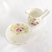 Load image into Gallery viewer, RARE vintage bone china creamer pitcher and open sugar set in the &quot;Gloria&quot; pattern with pink, purple and yellow flowers with green and gold accents. Produced by Royal Albert, England, circa 1940.   In excellent condition, no chips or cracks.  Creamer measures 4&quot; x 3-1/2&quot;  Sugar measures 3-7/8&quot; x 2-1/4&quot;
