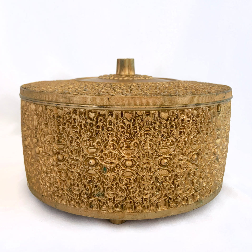 Love the fabulous vintage mid-century Hollywood Regency style of this 1950s era ornately decorated lidded storage container box metal...super glam!  In excellent condition, free from chips/cracks.  Measures 8ʺ × 4-1/4ʺ