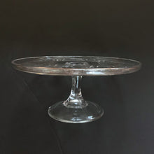 Load image into Gallery viewer, This vintage pressed glass pedestal cake stand features a geometric flower pattern. Crafted by Bryce Glass Co., USA, circa 1885. Perfect for serving cakeS, cupcakes or your favourite dessert! A lovely service piece for any occasion, or as part of a wedding dessert buffet.   Excellent condition, no chips or cracks.  Measures 9 1/4 x 4 inches   
