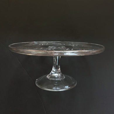 This vintage pressed glass pedestal cake stand features a geometric flower pattern. Crafted by Bryce Glass Co., USA, circa 1885. Perfect for serving cakeS, cupcakes or your favourite dessert! A lovely service piece for any occasion, or as part of a wedding dessert buffet.   Excellent condition, no chips or cracks.  Measures 9 1/4 x 4 inches   