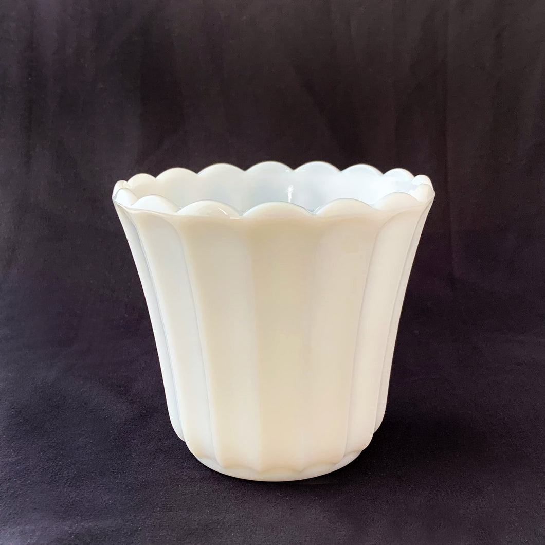 A classic vintage Grecian style milk glass planter. Produced by Continental Can Company, USA. Its fluted shape is ultra feminine and would be perfect for a pretty floral display, or your favourite house plant. Or repurpose as a candy dish, pencil or make-up brush holder. This piece lends itself well for use as wedding decor.  In excellent condition, no chips or cracks.  Measures 4 3/4 x 4 1/2 inches