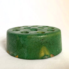 Load image into Gallery viewer, Vintage green ceramic flower frog with thirteen holes. Make a beautiful flower arrangement easy with one of these!  In good vintage condition with chipping to the bottom.  Measures 3 5/8 x 1 1/4 inches
