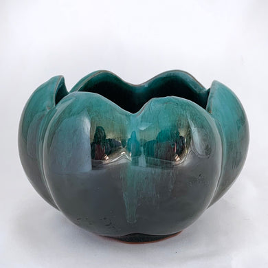 This elegant vintage lotus bowl planter would be a beautiful vessel for your favourite houseplant or succulent. Produced by Blue Mountain Pottery, Canada, circa 1960s. As typical with BMP pottery, the redware pottery is finished with a drip glaze in deep greens and black. Unmarked.  Excellent condition, no chips or cracks.  Measures 5 x 3 1/2 inches