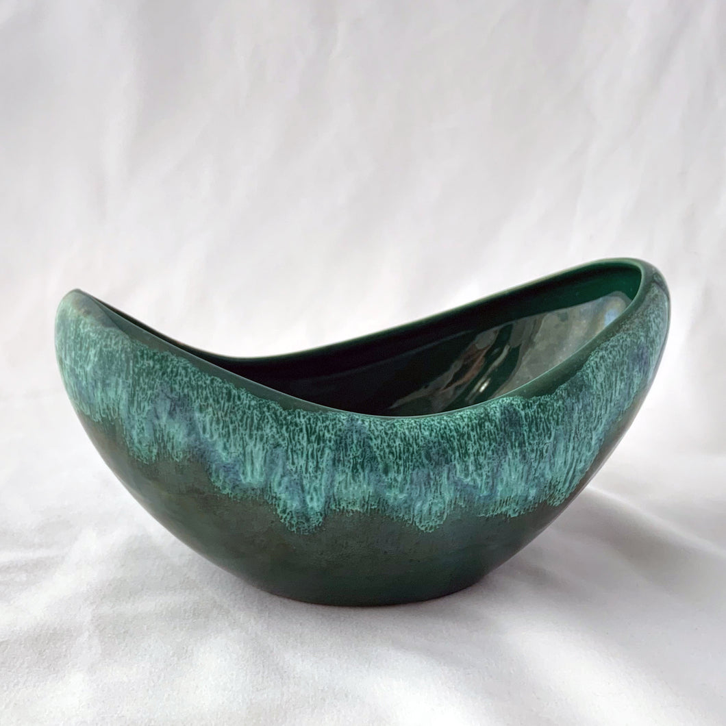 Fabulous vintage planter finished with green drip glaze. Maker unknown.  In excellent condition, no chips or cracks.  Measures 9 1/4 x 5 3/8 x 4 3/4 inches