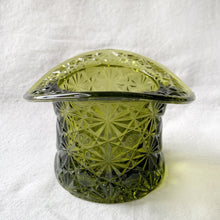 Load image into Gallery viewer, This sweet green glass top hat candy dish features the classic &quot;Daisy and Button&quot; pattern #2371. Crafted by the Indiana Glass Company, USA, circa 1970s. Fill this vessel with candies, nuts or repurpose as a catchall or office supply holder. A classic piece of American pressed glass!  In excellent condition, free from chips.  Measures 4 1/2 x 3 1/4 inches
