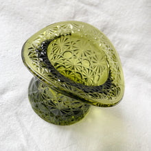 Load image into Gallery viewer, This sweet green glass top hat candy dish features the classic &quot;Daisy and Button&quot; pattern #2371. Crafted by the Indiana Glass Company, USA, circa 1970s. Fill this vessel with candies, nuts or repurpose as a catchall or office supply holder. A classic piece of American pressed glass!  In excellent condition, free from chips.  Measures 4 1/2 x 3 1/4 inches
