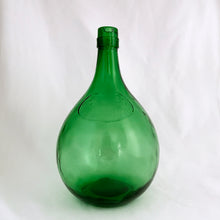 Load image into Gallery viewer, Vintage mold blown green glass demijohn. Impressed into the glass is &quot;Darrigo&#39;s Grape Juice Limited, 90 Caledonia Park R., 763 2207&quot;. Darrigo&#39;s is a decades old grape juice company in Toronto Canada. The bottle dates to the 1970s.  In excellent condition, free from chips/cracks.  Measures 6&quot; x 11&quot;  Capacity 3 quarts
