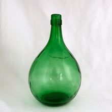 Load image into Gallery viewer, Vintage mold blown green glass demijohn. Impressed into the glass is &quot;Darrigo&#39;s Grape Juice Limited, 90 Caledonia Park R., 763 2207&quot;. Darrigo&#39;s is a decades old grape juice company in Toronto Canada. The bottle dates to the 1970s.  In excellent condition, free from chips/cracks.  Measures 6&quot; x 11&quot;  Capacity 3 quarts
