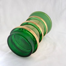 Load image into Gallery viewer, Stunning boho style glass vase in forest green with brilliant gold stripes and protruding ribs finishing in a trumpet shape. Likely produced in Czechoslovakia, maker unknown.  In excellent condition, no chips or cracks.  Measures 5 3/4 x 8 1/4 inches
