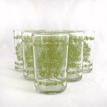 Load image into Gallery viewer, Vintage clear flat juice glass with green floral medallion graphic. Produced by Federal Glass, circa 1960/1970. This glass has never seen a dishwasher!  In excellent condition, no chips or cracks.   Measures 2 1/4 x 3 1/2 inches  Capacity 6 ounces
