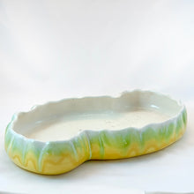 Load image into Gallery viewer, Sweet vintage drip glazed console bowl in yellow, green and creamy white. The colours are vibrant and meld together so nicely and really make the shape of this piece pop. Produced by Haeger Pottery, USA, circa 1950s. Perfect to use as an Ikebana vessel or for the bonsai hobbyist. Easily repurposed as a catchall or even giant snack dish.  In excellent condition, no chips or cracks. Measures 12 x 7  x 1 3/4 inches
