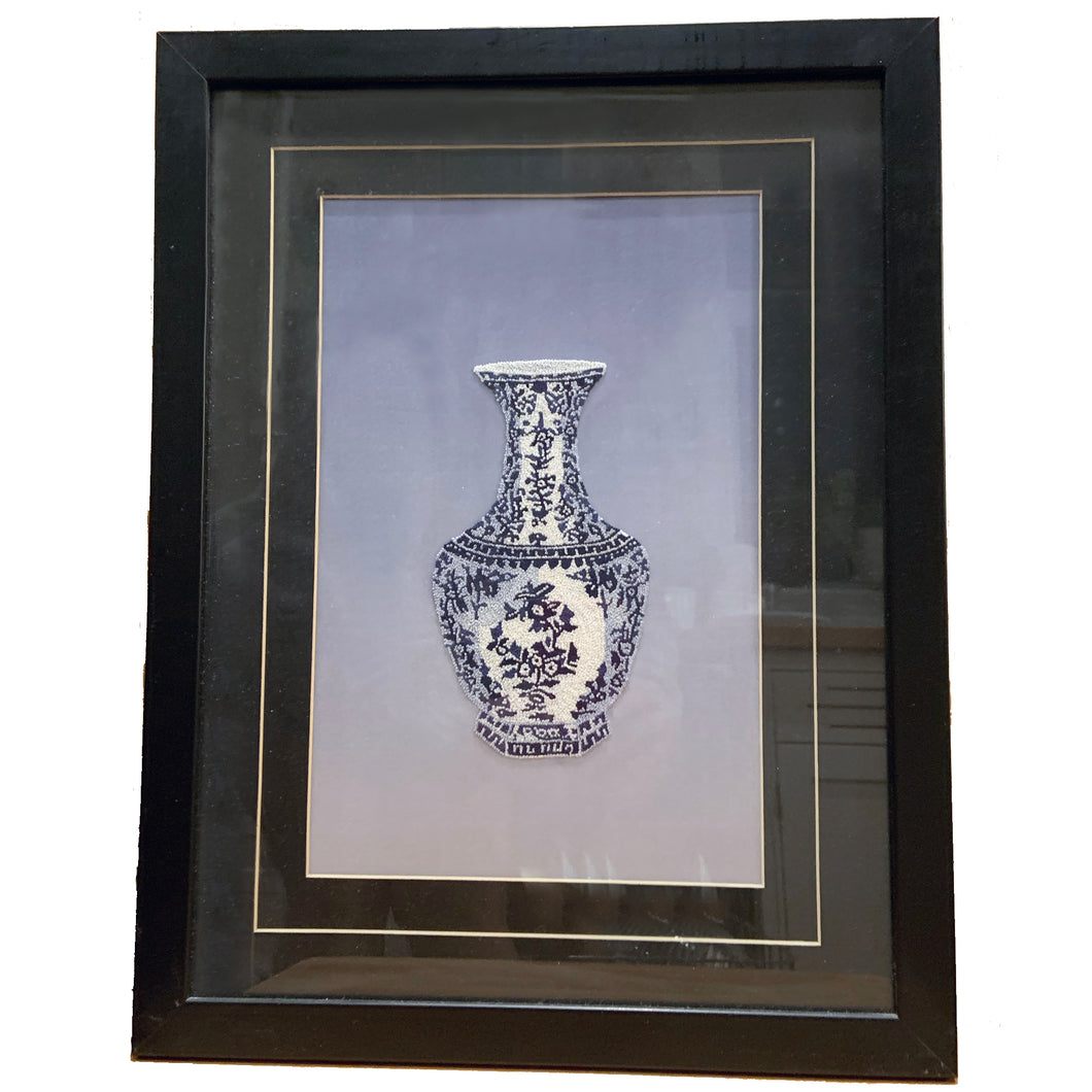 From a distance, one would think this blue and white Ming vase is a painting, however, it's actually a stunning silk embroidery on fine Chinese silk. It's an absolute masterpiece!  In excellent condition.  Image measures 7 1/2 x 11 1/4, frame measures 13 1/8 x 17 inches