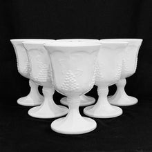 Load image into Gallery viewer, Stunning and elegant vintage &quot;Harvest&quot; milk glass water goblets. Set of six. Made by Colony Glass Company, circa 1970. These glasses will elevate any tablescape, they are so pretty!  In excellent condition, no chips or cracks.   Each goblet measures 3-1/2&quot; x 5-1/4&quot;
