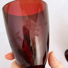 Load image into Gallery viewer, Vintage &quot;Ice Tea Royal Ruby&quot; footed tumbler glass, etched with floral design. Anchor Hocking Glass Company, circa 1940s.  In excellent condition, free from chips and cracks.  Measures 3 1/4 x 4 7/8 inches
