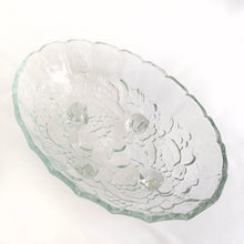 Load image into Gallery viewer, This vintage clear pressed glass oval shaped footed bowl in the &quot;Harvest Grape&quot; pattern has a lovely scalloped edge and is perfect vessel to hold your favourite fruits. Produced by the Indiana Glass Company, USA, circa 1970. Makes a fabulous centrepiece, buffet or counter display.  In excellent condition, free from chips/cracks.  Measures 12 x 8 1/2 x 4 1/2 inches
