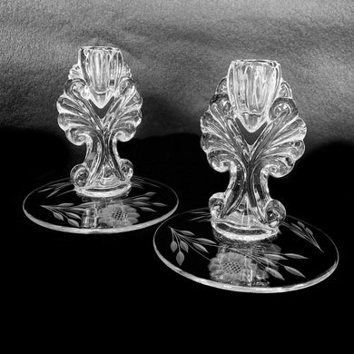 We have a striking pair of vintage 1-lite candle holders cut with WJ Hughes twelve-petalled 