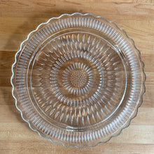 Load image into Gallery viewer, Fabulous vintage mid century pressed glass cake plate with chrome dome lid with stylized metal handle. The plate has a floral starburst design with a rim to hold the dome in place. A perfect way to keep your pretty cakes and dessert safe and fresh. Produce my KROMEX, USA, circa 1950/60.  In good vintage condition. The plate is mint and the dome is near mint.   The cake plate measures approximately 12 x 1/2 inches and the dome measures 11 1/2 x 6 inches
