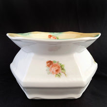 Load image into Gallery viewer, Vintage hexagon-shaped porcelain ladies spittoon, decorated with sprays of beautiful peach roses in a six sided shape. Marked Germany. Early 20th century. Repurpose this piece into a stunning vessel for a houseplant.  In good vintage condition, with 1 minor chip to the rim which is barely noticeable.  Dimensions: 7-1/4&quot; x 4&quot;
