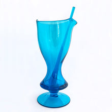 Load image into Gallery viewer, Stunning vintage mid-century laser blue hand blown glass martini cocktail pitcher with matching teardrop shaped glass stirring rod. The pitcher has a distinct feminine shape with a footed bottom and the colour is out of this world!  In excellent condition, free from chips/cracks.  Pitcher measures 5&quot; x 10-1/4&quot;, glass rod 10-1/4&quot;
