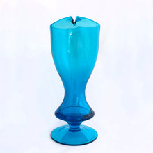 Load image into Gallery viewer, Stunning vintage mid-century laser blue hand blown glass martini cocktail pitcher with matching teardrop shaped glass stirring rod. The pitcher has a distinct feminine shape with a footed bottom and the colour is out of this world!  In excellent condition, free from chips/cracks.  Pitcher measures 5&quot; x 10-1/4&quot;, glass rod 10-1/4&quot;
