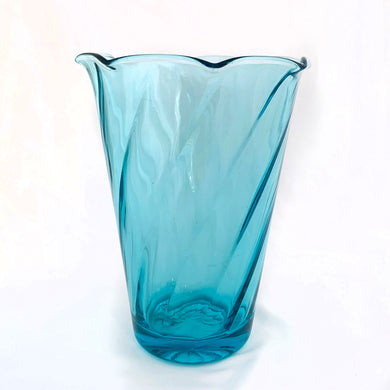 Capri blue swirled glass, flared shaped vase with a ruffled edge. Produced by the Hazel-Atlas Glass company between 1940s - 1960s. In excellent condition, free from chips/cracks. Measures 3 5/8 (base) 6 1/2 (rim) x 8 3/8 inches (height)