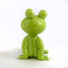 Load image into Gallery viewer, Adorable vintage mid-century ceramic figurine of a smiling, cross-legged lounging lime green frog. Produced by Noritake of Japan for Gift Craft Toronto, circa 1970s. A great decor piece...it&#39;s just such a happy and fun piece!  In excellent  condition free from chips/cracks/repairs.  Measures 3 1/4 inches tall
