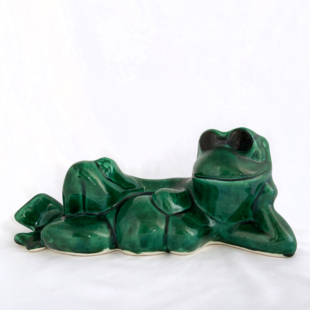 Fantastic vintage retro ceramic figural planter of a bikini clad, sunglass wearing sexy lounging green frog. A great decor piece or plant this froggy some hair with your fave houseplant or succulent. It's just so funky and in the running to be voted the internet's 'sexiest' frog!   In excellent  condition free from chips/cracks.  Measures 12