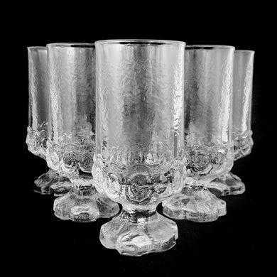 Set of six vintage clear Franciscan Madeira iced tea glasses. Crafted by Tiffin Glass, USA, 1972 - 1977. With exceptional design and function, these will make a wonderful addition to your tablescape!

In excellent condition, no chips.

Measures 2 7/8 x 6 1/2 inches