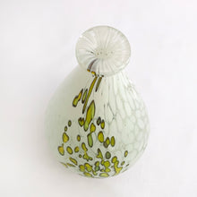 Load image into Gallery viewer, An art glass paperweight bud vase with clouds of white and green glass. Produced by Mdina Glass, Island of Malta, circa 1980s. Perfect decor for small spaces!  In excellent condition, no chips or cracks. Bottom marked &#39;Mdina&#39; with original sticker.
