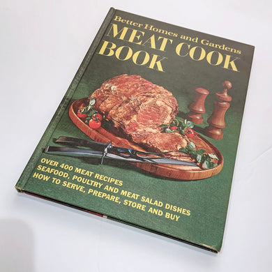 Better Homes and Gardens is known for its fabulous cookbooks. This hardcover cookbook focuses on meat inspired recipes. Its 160 pages are filled with amazing  recipes along with many colour photographs. Originally published by Meredith Corporation, USA, 1969. This is the second printing, also 1969.   In great vintage condition with normal age-related yellowing.