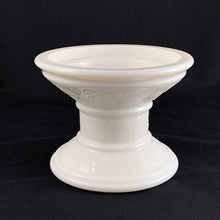 Load image into Gallery viewer, Versatile vintage milk glass pedestal candle holder, features a embossed swirl detail. May be used with several sized candles including taper, 2" votive, 3" pillar and 4" pillar, with the reverse side perfect for a round candle.

In excellent condition, no chips. Unmarked.

Measures 4 3/8 x 3 3/8 inches
