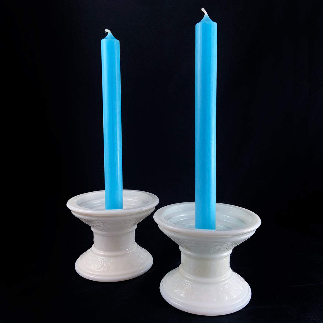 This is a really cool pair of vintage milk glass candle holder pedestal with raised swirl detail, circa 1960. What makes them cool and practical is that they accommodate taper candles, 2
