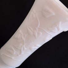 Load image into Gallery viewer, A lovely trumpet shaped footed milk glass vase is embossed with a pattern of intertwining vines.  In excellent condition, no chips or cracks.  Measures 4 1/2 x 9 1/2 inches

