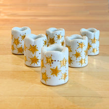 Load image into Gallery viewer, Set of six vintage mini taper holly berry porcelain candle holders perfect for Christmas or any special celebration decorating, adding ambience to your holiday decor! Made by Funny Design of West Germany.  In excellent condition, no chips or cracks.

