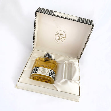 Vintage full 2 ounce bottle of 'Miss Dior' eau de toilette in gift box. Created by perfumer François Demachy for Christian Dior, Paris France. As Dior's debut fragrance, Miss Dior was introduced in 1947 alongside the first Christian Dior collection in Paris at 30 Avenue Montaigne.
