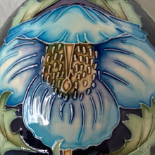 Load image into Gallery viewer, Collectors Club 2004 Limited Edition &quot;Meconopsis&quot; or Himalayan Poppy art pottery vase, numbered 97/150. This piece is hand painted in the slip glaze technique on a deep blue ground with shades of blue, yellow, brown and green. Designed by Rachel Bishop. Shape 75/10. Produced by Moorcroft Pottery, England, 2004.  In excellent condition, no chips, cracks or repairs. First quality. Offered from our personal collection.  Measures 4-1/2&quot; x 11&quot;
