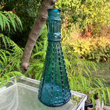 Load image into Gallery viewer, Beautifully detailed, collectible boho style teal glass bottle or decanter. Produced by Morey Mallorca Destilerias in Spain. Circa 1970.  In excellent condition.  Measures 4 1/4 x 11 1/2 inches
