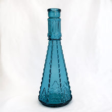 Load image into Gallery viewer, Beautifully detailed, collectible boho style teal glass bottle or decanter. Produced by Morey Mallorca Destilerias in Spain. Circa 1970.  In excellent condition.  Measures 4 1/4 x 11 1/2 inches

