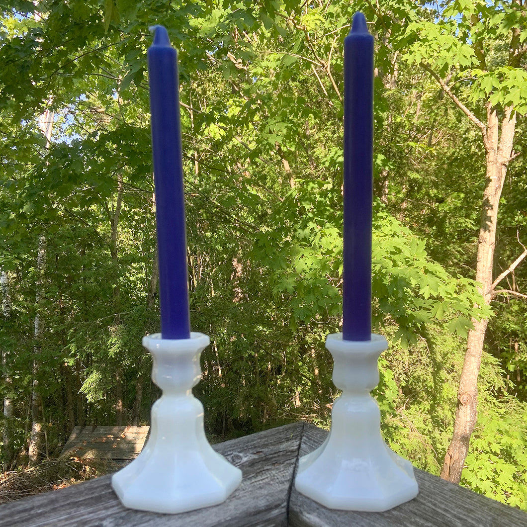 This classic pair of octagonal-shaped milk glass candlestick holders is the epitome of simple elegance and will add a special touch to any table setting. Made by the Anchor Hocking Glass, circa 1970.  In excellent condition, no chips/cracks/repairs.  Measures 3 1/2 x 4 1/8 inches