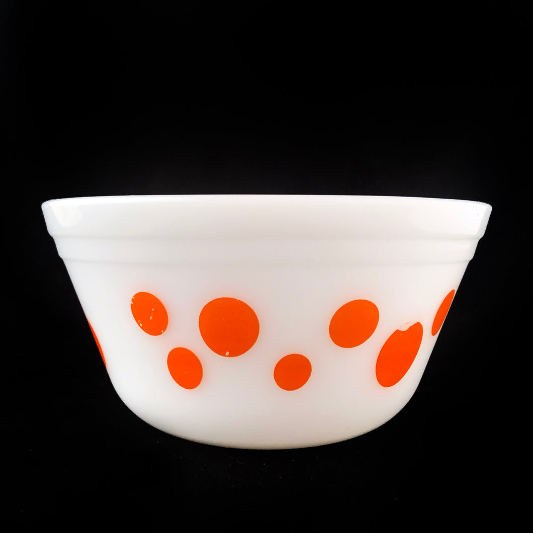 Classic vintage white milk glass mixing bowl decorated with a pattern of orange dots. Produced by Federal Glass, USA, circa 1960s. Perfect for mixing, serving and storing your culinary creations! In good vintage condition, no chips or cracks and the printing is shiny and vibrant. There is minor to wear to a few of the dots and one dot appears to have a manufacturer's defect where part of the dot is missing.  Measures 6 x 3 inches