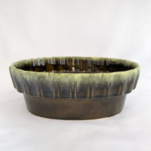 Load image into Gallery viewer, A great vintage oval shaped planter with scalloped sides details and a really nice green drip glaze. A great vessel for houseplants or use as a decorative object. Made my Hull, USA, shape I-21.  In excellent condition, no chips, cracks or crazing.   Measures 6 1/4 x 3 1/2 inches
