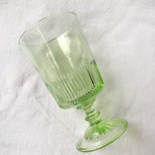 Load image into Gallery viewer, Stunning apple green vintage style footed water goblet. The glass has a starburst foot and the lower half of each glass has a ribbed detail. A beautiful addition to any tablescape!  In excellent condition, free from chips or cracks. Made by Martha Stewart in the USA.  Measures 3 1/2 x 6 1/2 inches  Capacity 15 fluid oz
