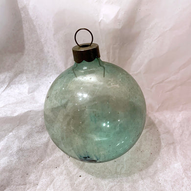 Vintage hand blown transparent smokey green glass ball Christmas tree ornament with great patina.   In vintage condition.  Measures 2