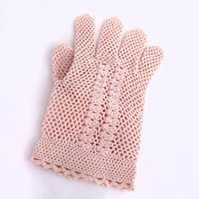 Load image into Gallery viewer, This is a stunning pair of vintage blush pink crochet gloves with a beautiful lace crochet detailed pattern on the back of the hand and at the cuff. Made with impeccable craftsmanship. Their light and breathable design make them perfect for a spring or summer occasion. These have a somewhat stretchy property making them  easier to fit over the hand.
