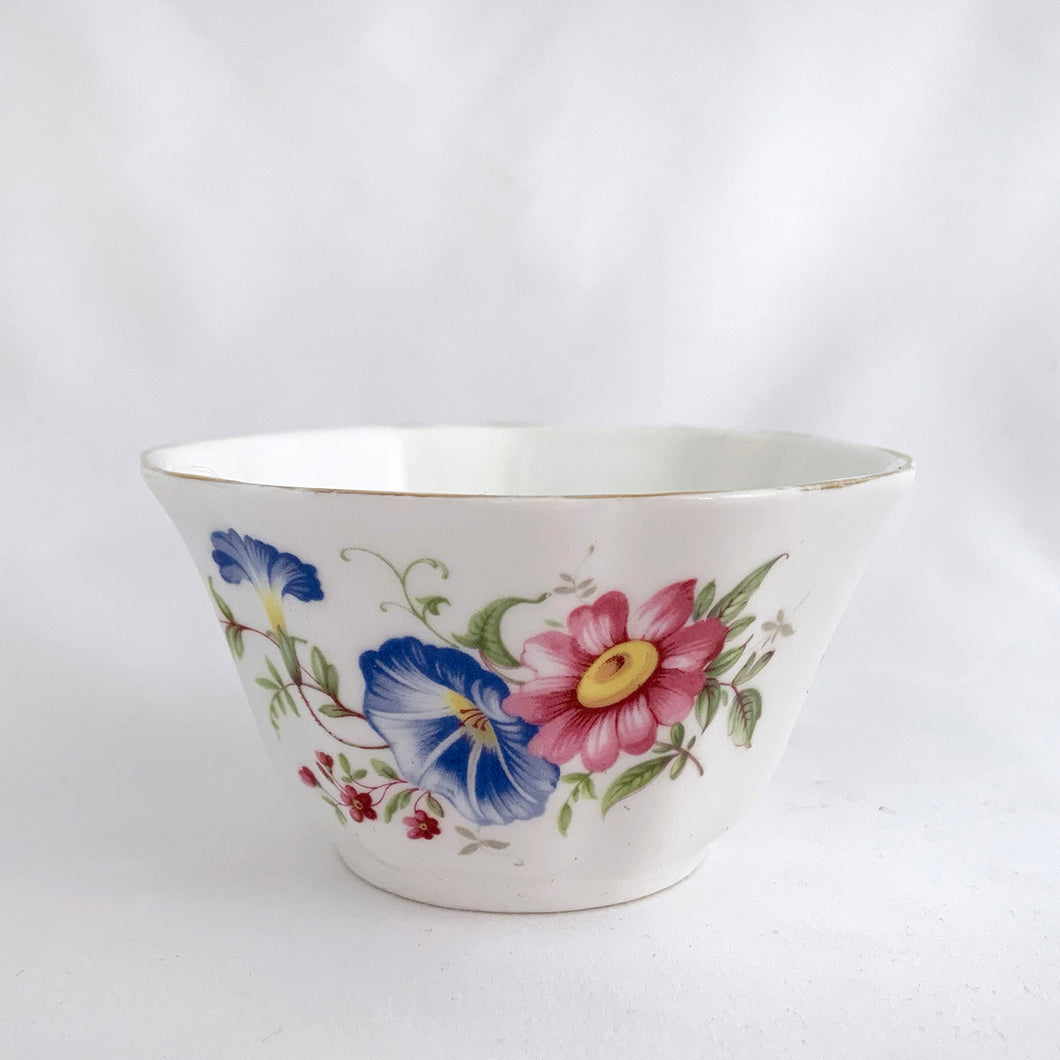 Pretty vintage fine bone china open sugar bowl decorated with pink daisy and blue morning glory. Produced by Royal Grafton, England. In excellent condition, free from chips/cracks/repairs.  Measures 3-1/2