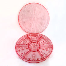 Load image into Gallery viewer, Vintage plastic divided storage tray with lid in a pinwheel pattern. Use to store candies and/or nuts, veggies and dip, or repurpose to store craft supplies.

In good vintage condition with some wear.

10 3/4 x 1 1/4 inches
