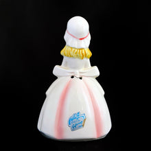 Load image into Gallery viewer, Vintage pink prayer lady bell. Produced by Enesco for Giftcraft, Japan, circa 1950s. A sweet kitsch kitchen collectible!  In excellent vintage condition, free from chips/cracks/repairs. Minor flea bit to the inside rim.  Measures approximately 4-1/2&quot; tall
