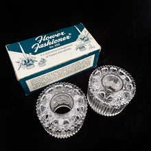 Load image into Gallery viewer, Vintage set of two crystal plastic &quot;Flower Fashioners&quot; #650 with built-in flower holder for fresh and artificial flower arrangements and may be used with a candle. Use the fashioner for an arrangement or box for prop styling.  Measures 2-3/8&quot; x 1-5/8&quot;  In excellent condition in original box.
