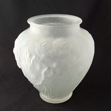 A stunning pressed satin glass vase embossed with flowers and foliage of the poppy plant. This piece is from the 